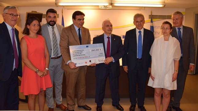 EUStaff4Refugees: Handing over to the Greek Red Cross a check...