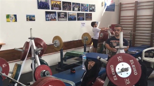 The coach Dimitris Ioannidis and the athletes Dimitris Bakohristos...