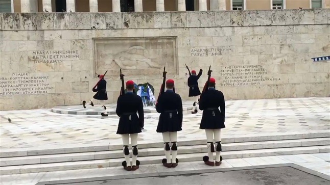 Watch the Changing of the Guards at the monument of the Unknown...