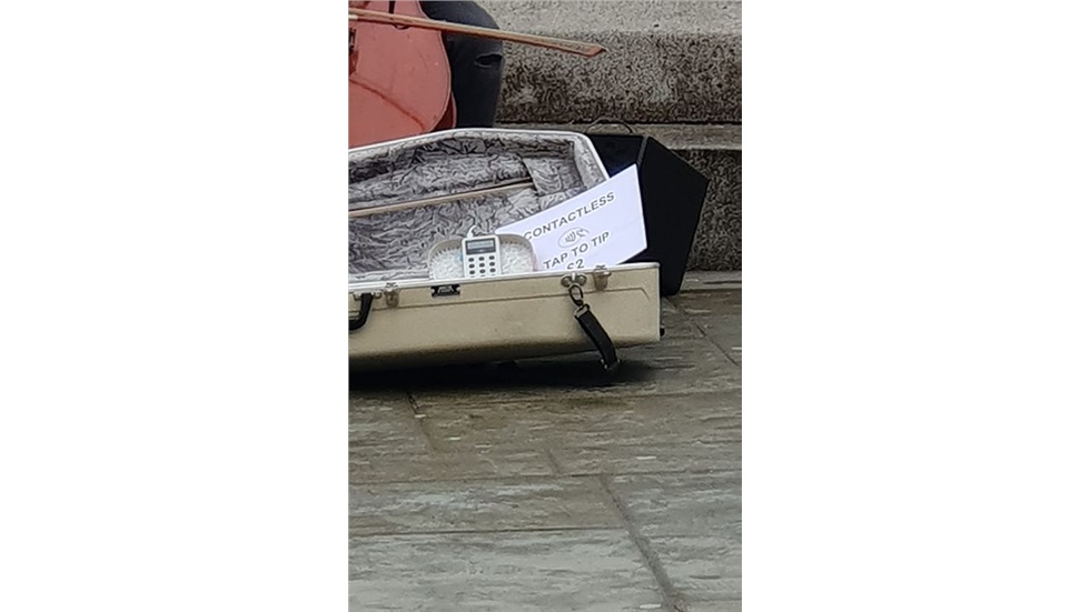 Some street artists in London now accept contactless payments