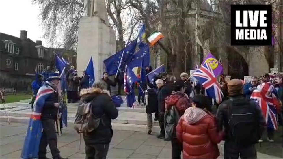 Hundreds of people against or in favour of Brexit have gathered...