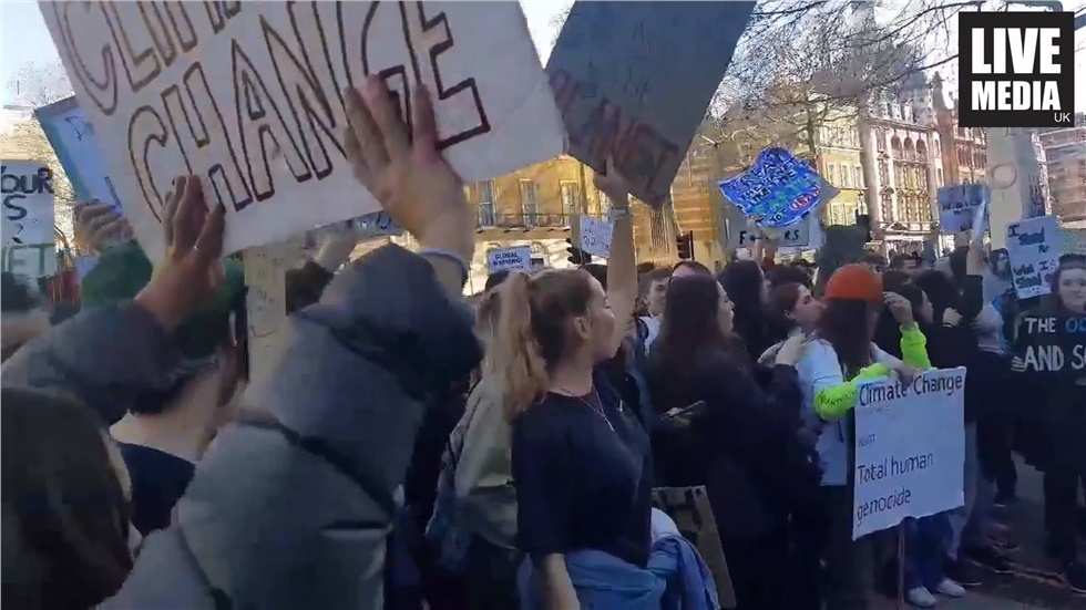 Thousands of students marched on Friday afternoon through central...