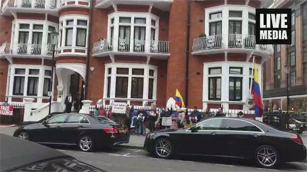 Now outside the Ecuadorian Embassy in London.  Supporters of...
