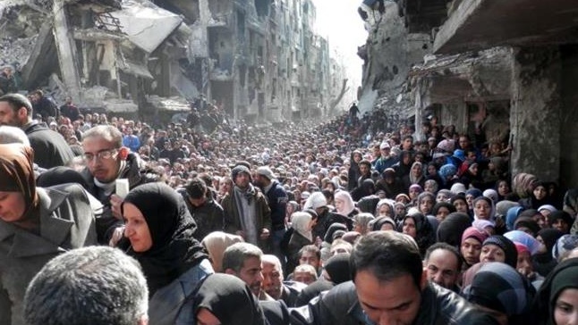 Waiting for food in Damascus : Associated Press photo reveals...